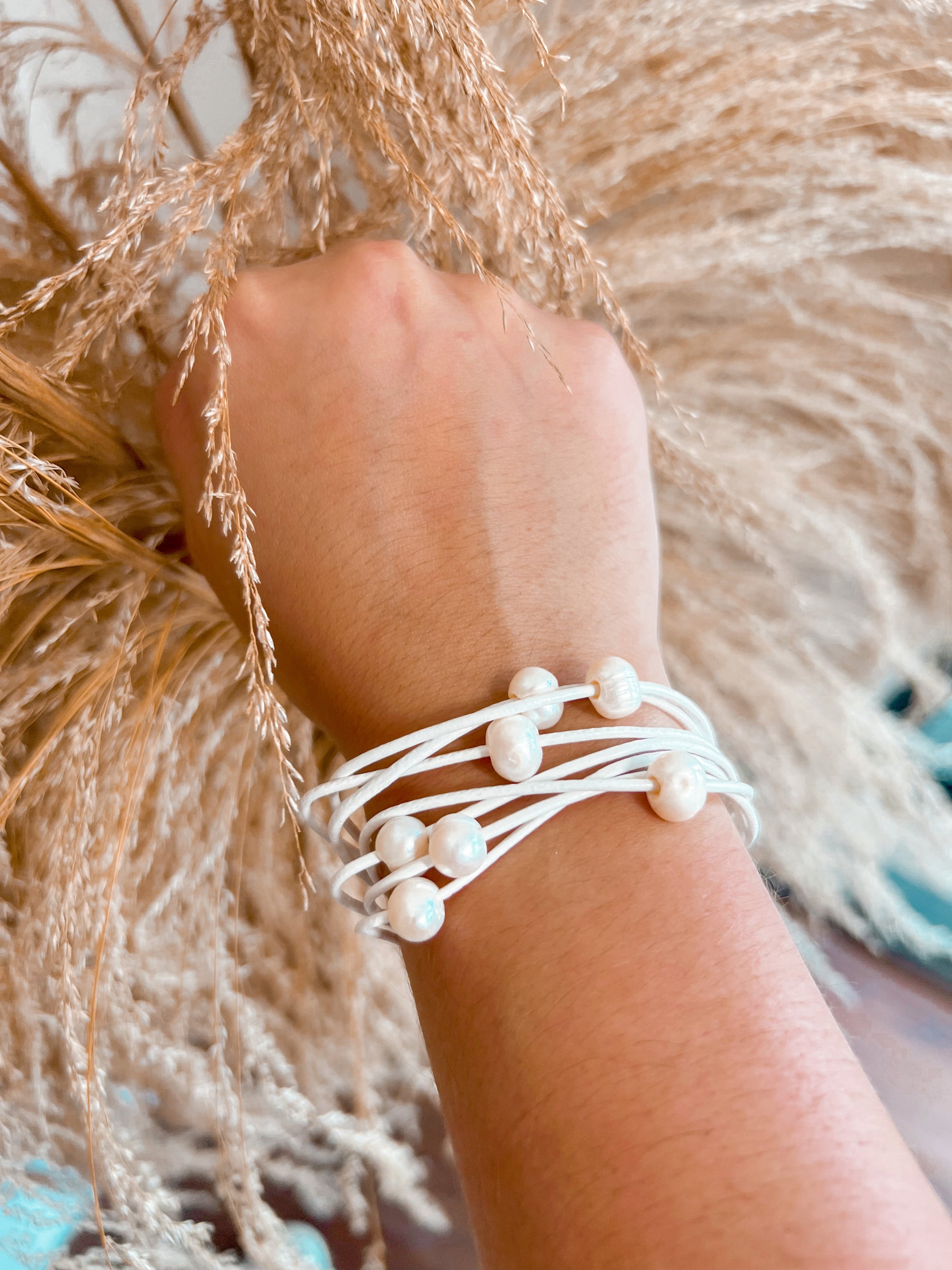 Pink Panache 7 Strand Pearl Bracelet-Bracelet-Pink Panache-05/19/24,1st md,SEPT2021-The Twisted Chandelier