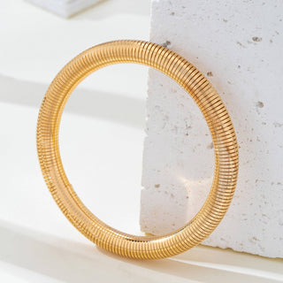 Gold-Tone Flexible Coil Bangle-JOSSLYN by wall to wall-80B1714-The Twisted Chandelier