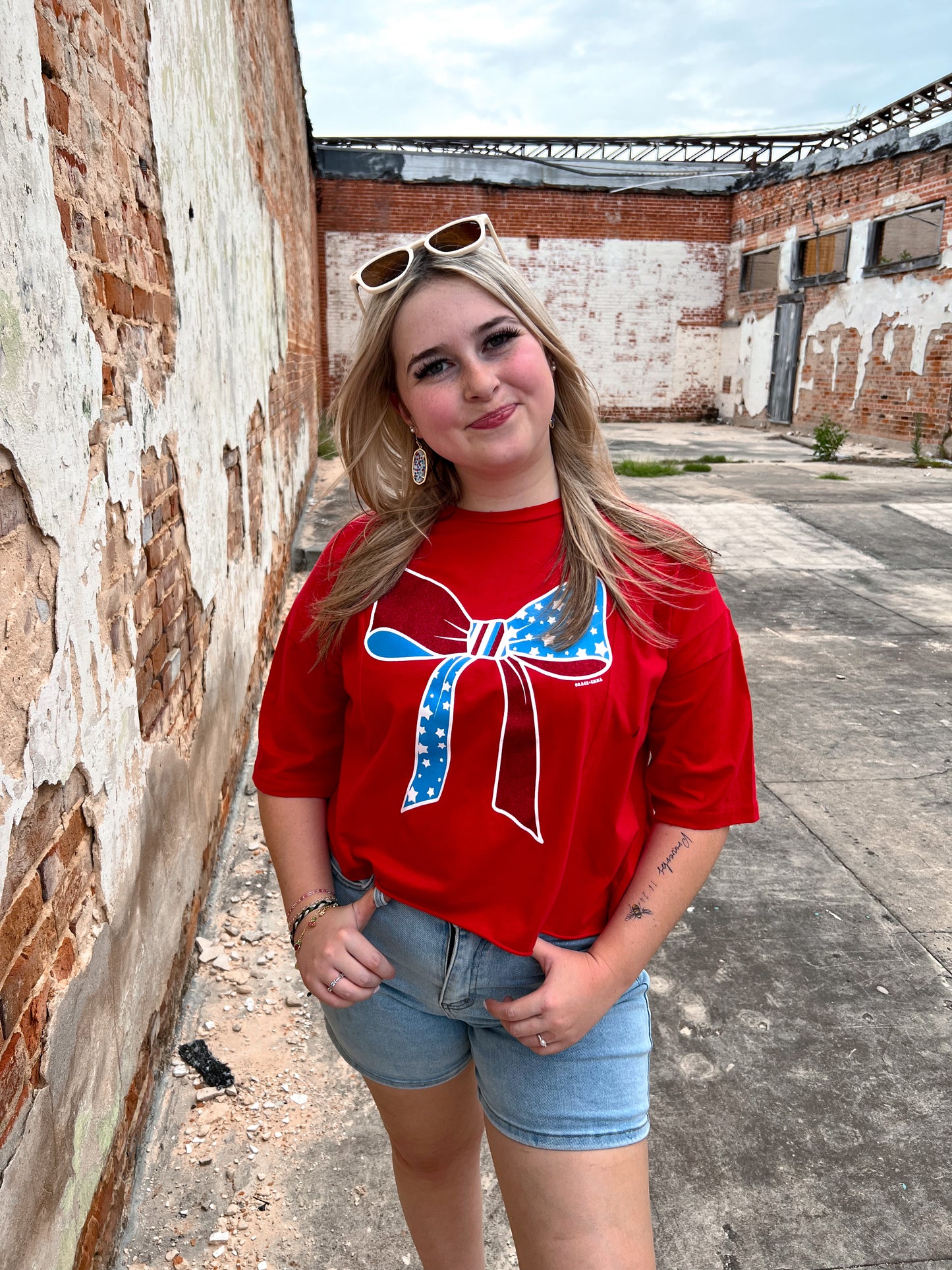 Red White And Blue Bow Tee Shirt-Apparel & Accessories-Southern Grace Wholesale-6893e-red-bow, Bin a6, FD 04/09/24, not on the floor only in the bins-The Twisted Chandelier