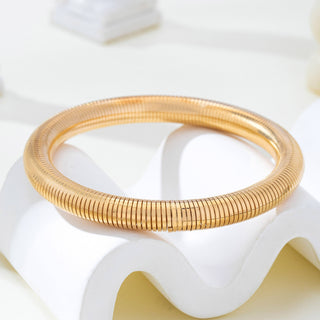 Gold-Tone Flexible Coil Bangle-JOSSLYN by wall to wall-80B1714-The Twisted Chandelier