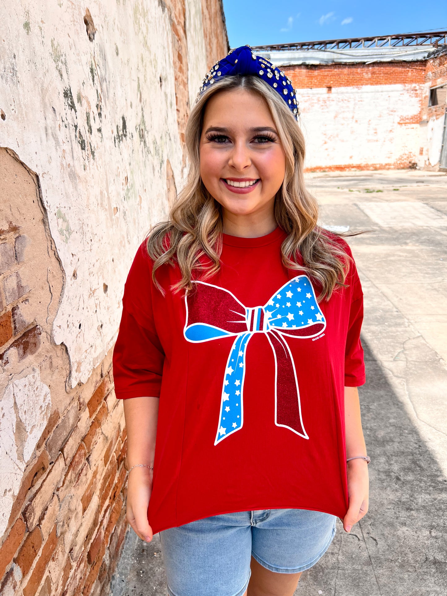 Red White And Blue Bow Tee Shirt-Apparel & Accessories-Southern Grace Wholesale-6893e-red-bow, Bin a6, FD 04/09/24, not on the floor only in the bins-The Twisted Chandelier